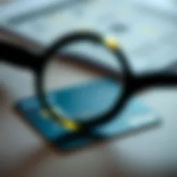 A close-up view of a credit card with a magnifying glass