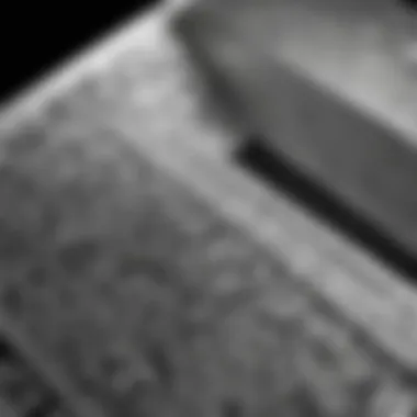 A close-up view of a silver bar with intricate designs